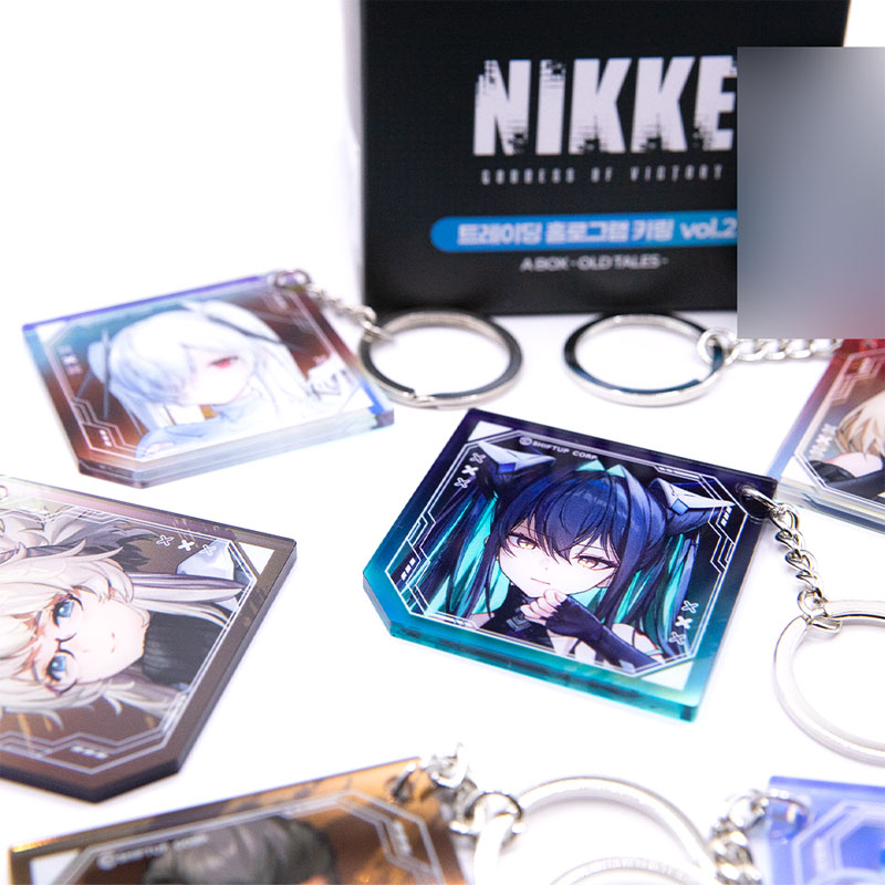 勝利の女神NIKKE カセット型キーホルダー　ホログラムカード　2セット 勝利の女神】NIKKE カセットテープ型キーホルダー&ホログラム